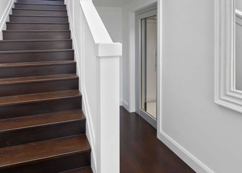 glass door lift and stairs
