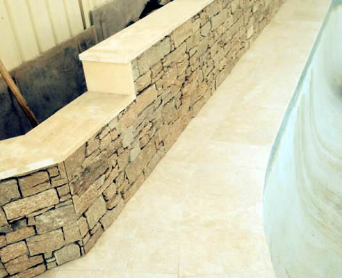 stone clad pool surround