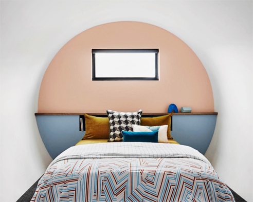 Orange coral bedroom interior from Dulux