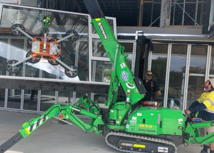 Glass Lifting with Mini Cranes by Preston Hire