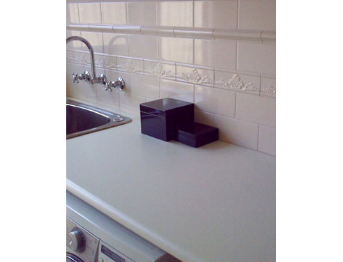 french provincial border tiles in laundry