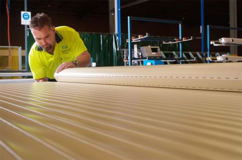 man making roller shutter