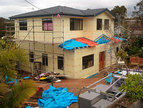 house clad with extruded polystyrene insulation