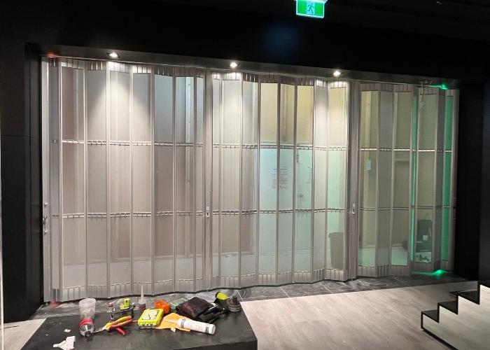 Quality Commercial Sliding Doors with Perforated Mesh Infill by ATDC