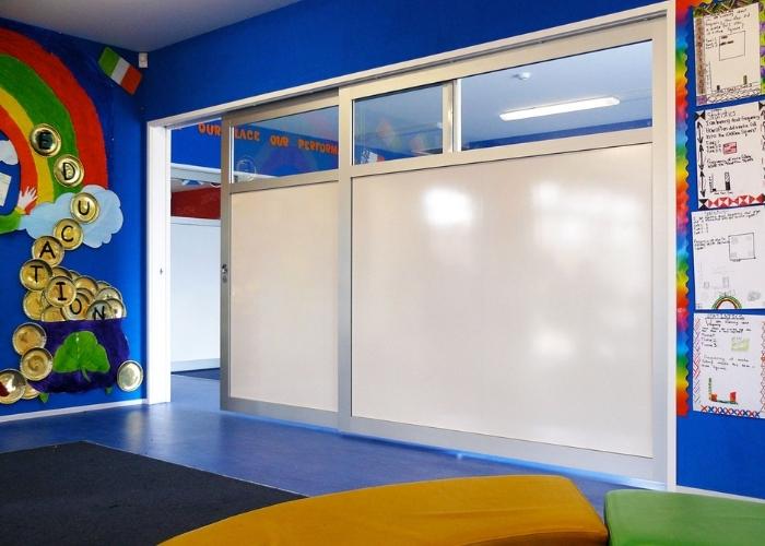 Cavity Sliders with Whiteboard and Glass Doors for Schools by CS Cavity Sliders