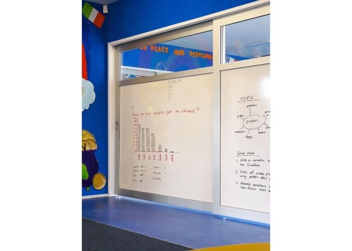 Cavity Sliders with Whiteboard and Glass Doors for Schools by CS Cavity Sliders
