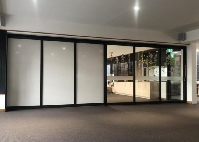 Cavity Sliders with Whiteboard and Glass Doors for Schools by CS Cavity Sliders