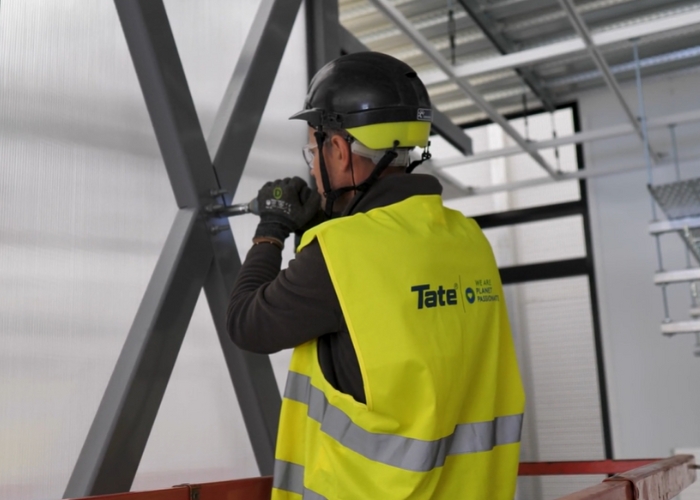 Advantages of Ceiling Supported Aisle Containment System by Tate