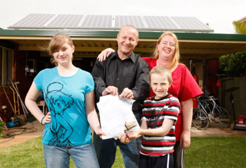 family with pv solar system