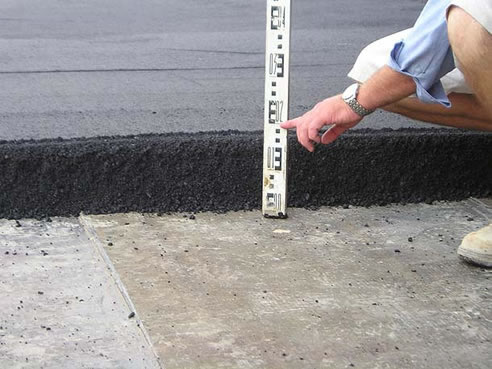 measuring the depth of asphalt