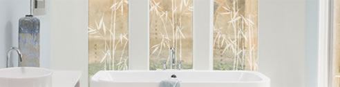 decorative window frosting in bathroom