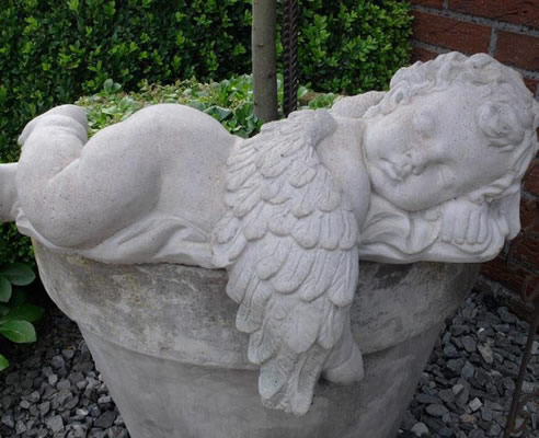 sleeping angel statuette
