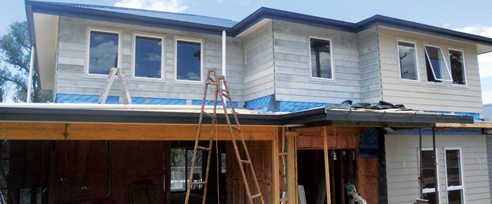 inex weatherboard clad house