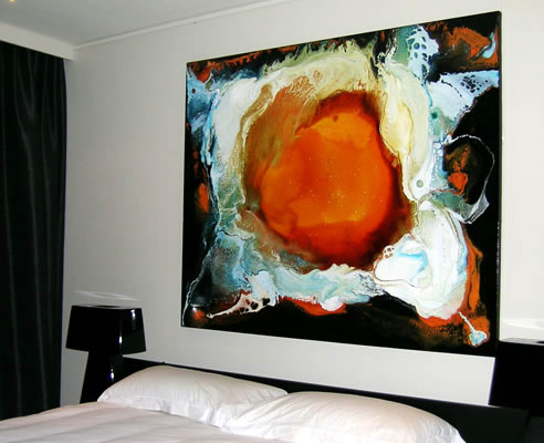 abstract painting above bed