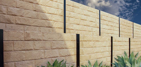 sandstone look concrete sleeper retaining wall