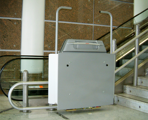 Curved stairway platform lift from RAiSE Lift Group