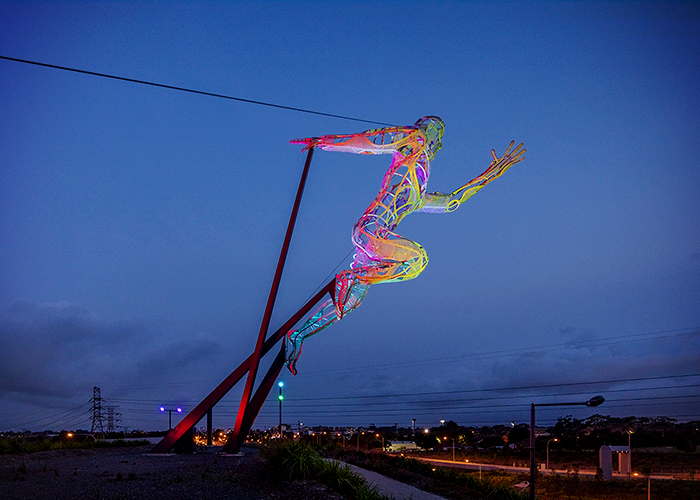 Illumination of Iconic Sculpture The Sprinter by WE-EF
