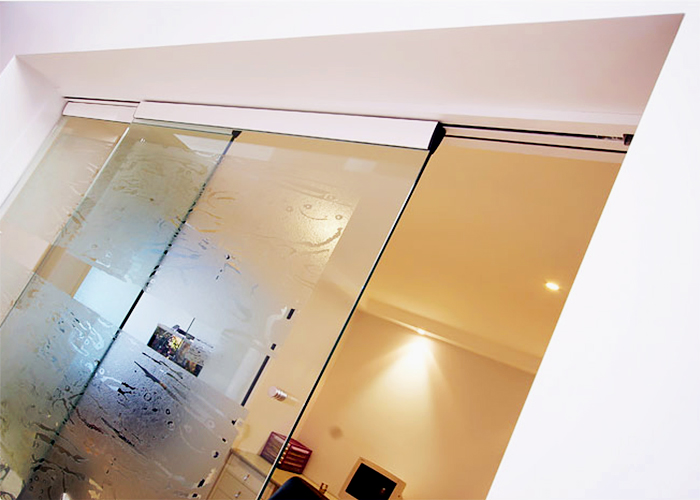 Frameless Glass Partition Doors from Smooth Door Systems