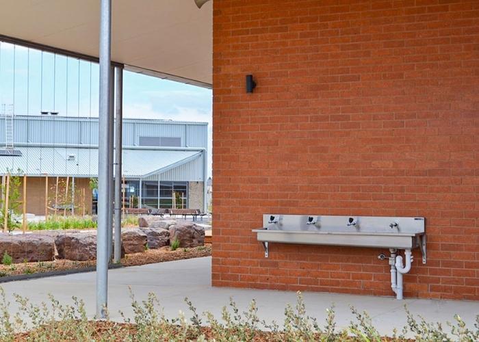 Stainless Steel Accessible Drinking Trough, Benching, and Sinks for Victorian Primary School by Britex