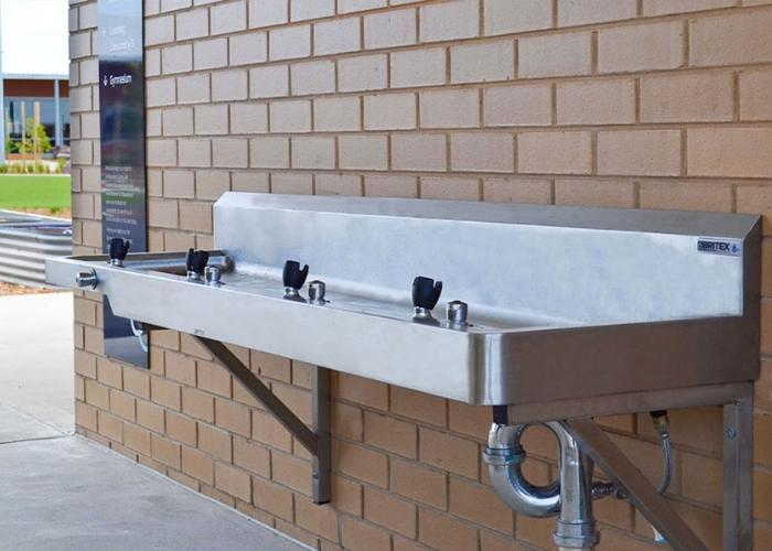 Stainless Steel Accessible Drinking Trough, Benching, and Sinks for Victorian Primary School by Britex