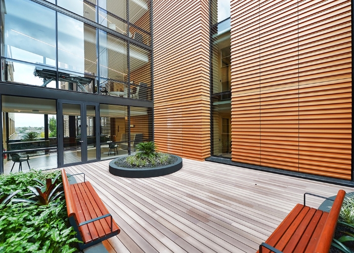 Powder-Coated Aluminium Decking with Timber Grain Finish by DECO Australia