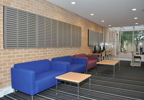 acoustic panels on brick wall