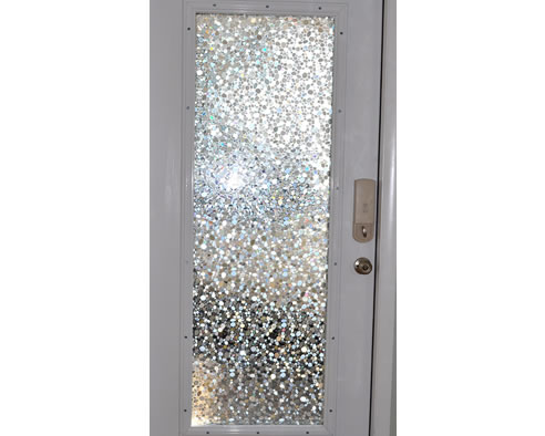 door with decorative glazing film