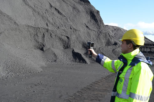 hand held thermal imager reading coal pile