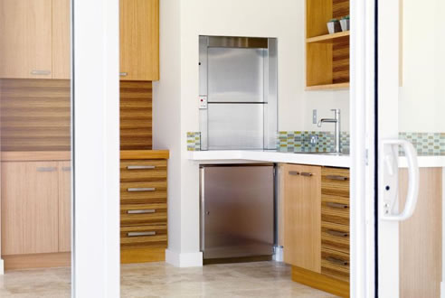 stainless steel dumbwaiter in kitchen