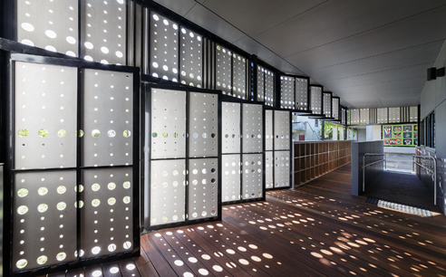 perforated facade filtered light