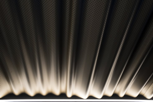 pale bronze anodised corrugated perforated aluminium
