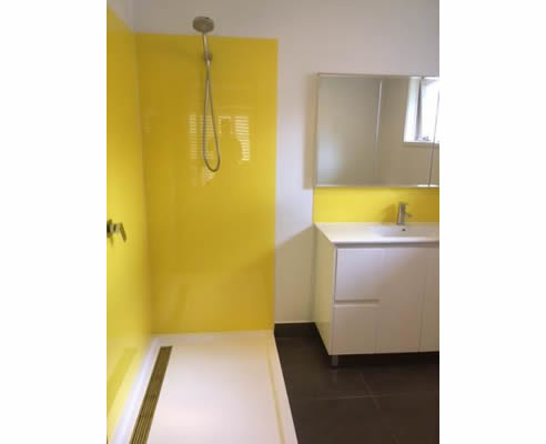 yellow acrylic shower splashback