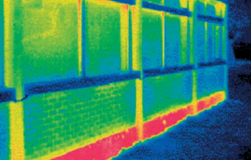 thermal image shows the major cold bridge and high thermal loss at the junction between the floor slab and wall construction