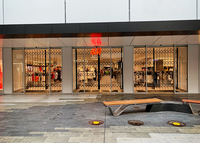 World Class Security Shutters for H&M from Trellis Door Co