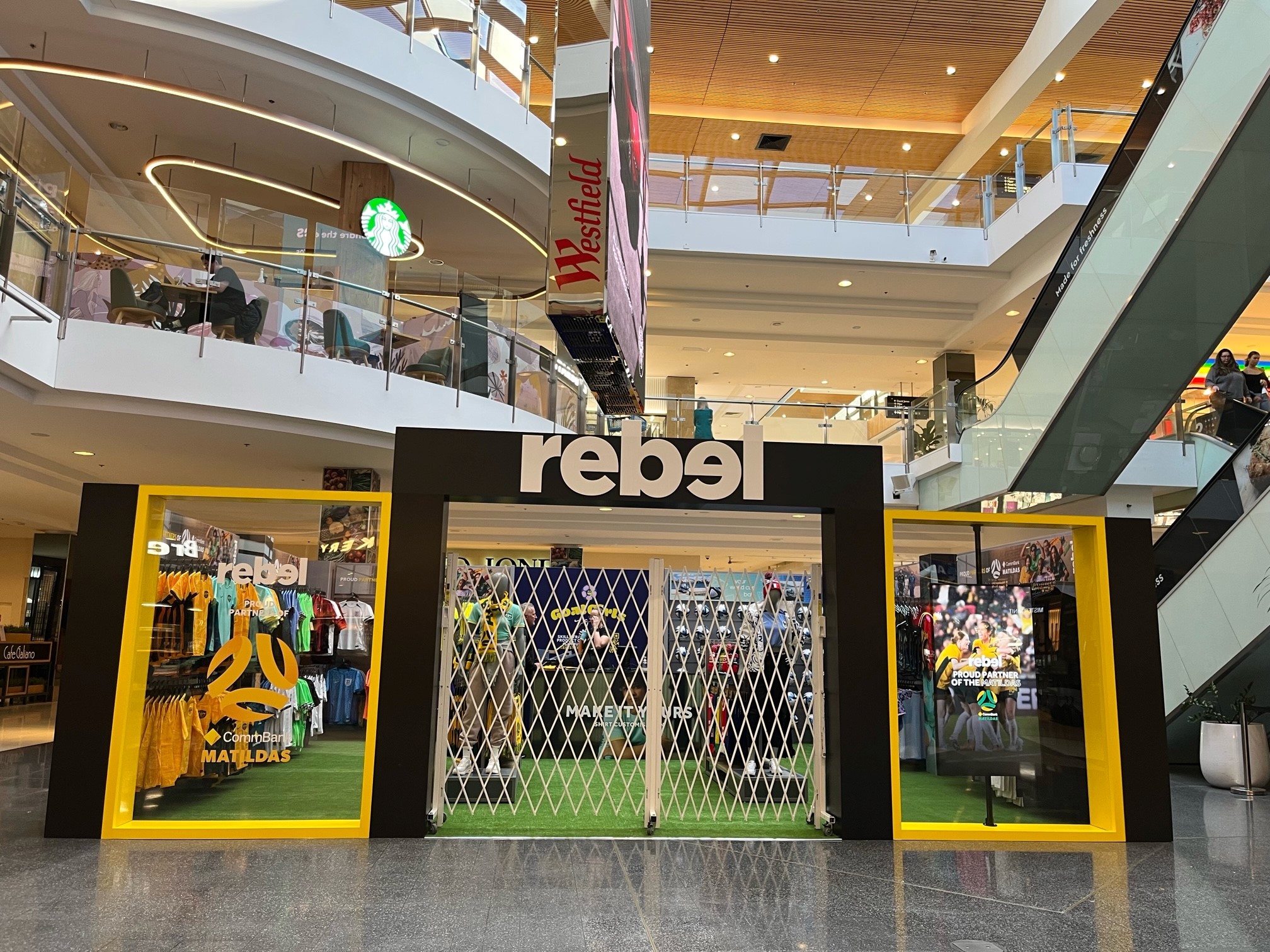 Trackless Trellis Security Doors Secure Pop-up Stores for Women's World Cup 2023