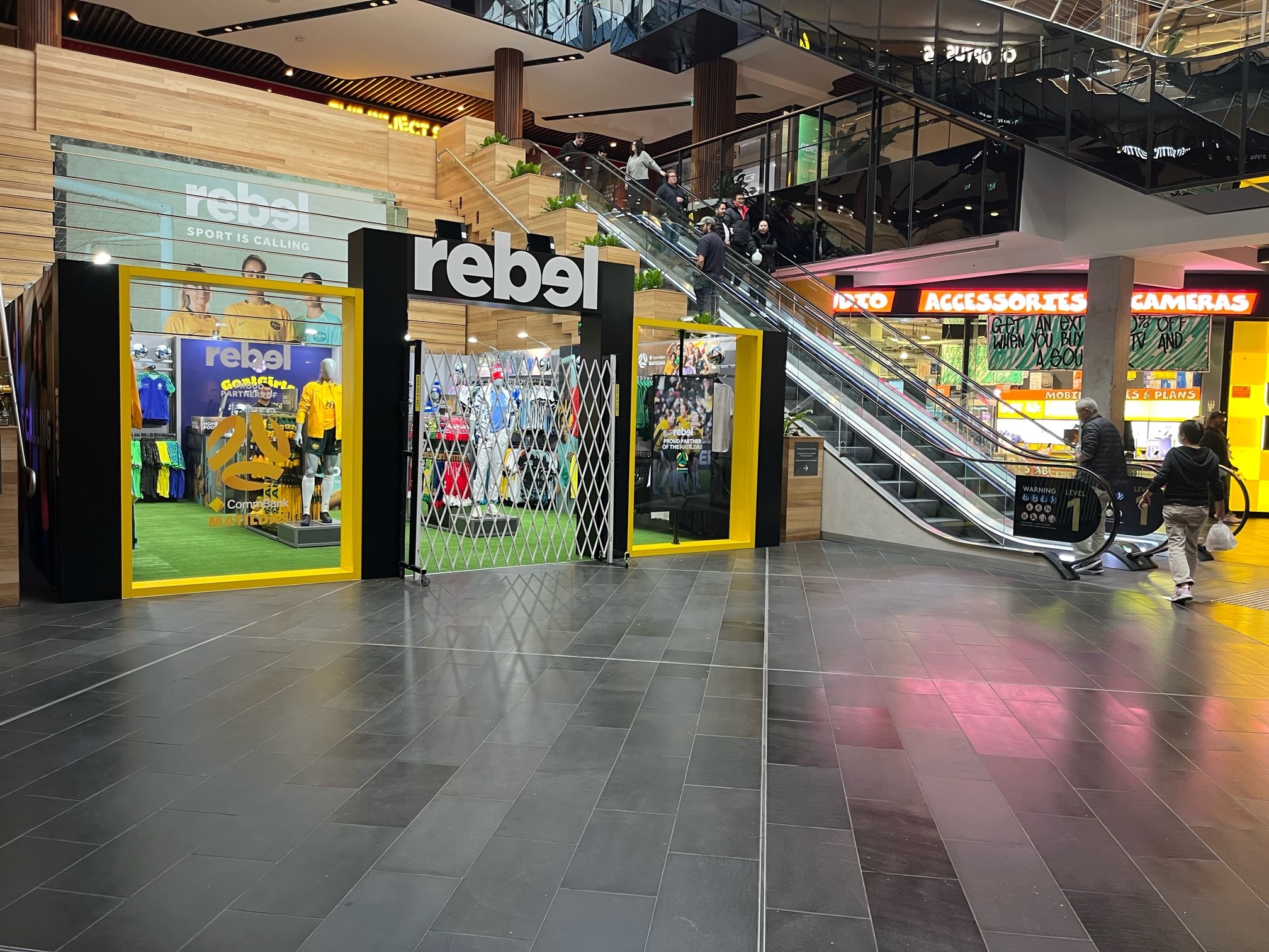Trackless Trellis Security Doors Secure Pop-up Stores for Women's World Cup 2023