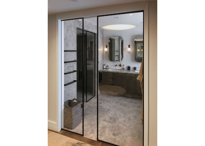 Bi-Parting Glass Cavity Sliders for Bathrooms by CS Cavity Sliders