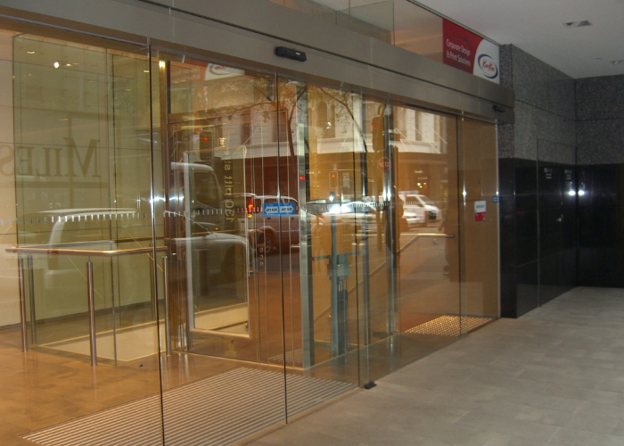 Frameless Sliding Door Operator by ADIS