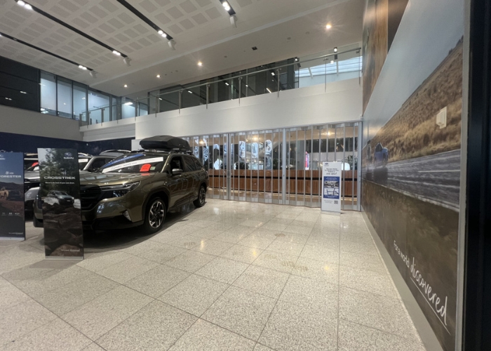 Folding Closure Doors for Premium Automotive Showrooms by ATDC