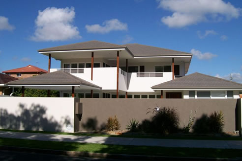 house with gutters protected with gutter mesh