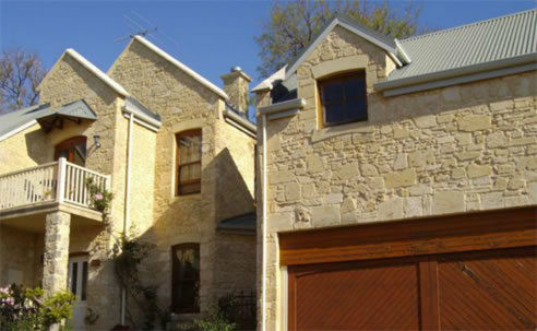 house clad with limestone