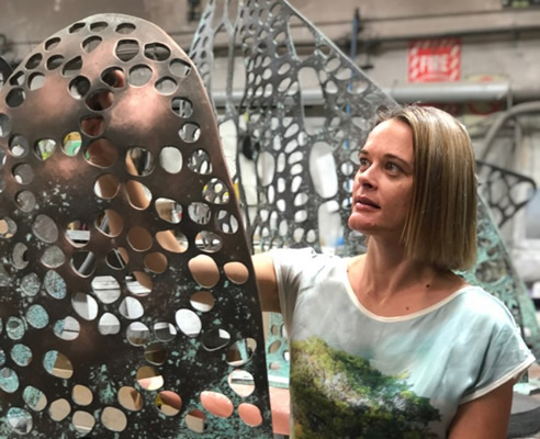 Jade Oakley with Interplay Sculpture