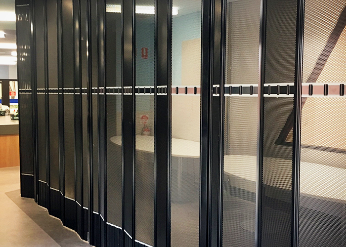 Perforated Folding Closure Doors for Security from Trellis Door Co