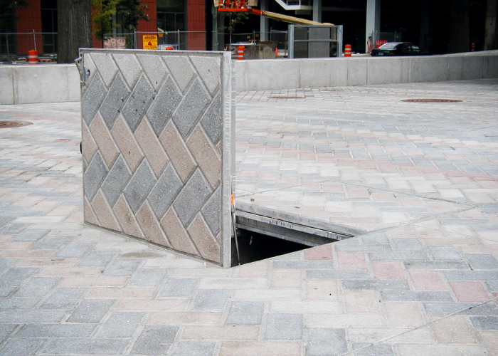 Aluminium Infill Hatches That Blend Into the Pavement by EJ