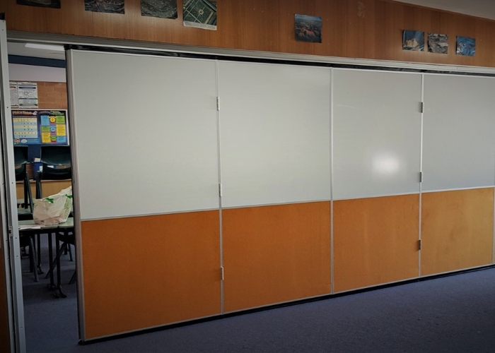 Operable Wall Partitions with Retractable Floor Seals for Classrooms by Bildspec