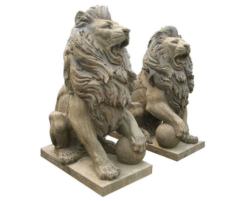 stone carved lions with orbs