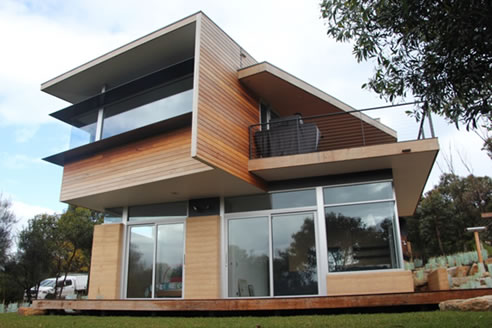 rammed earth house insulated with foamular