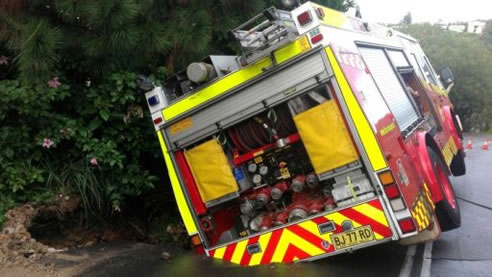 fire truck roadside sink hole