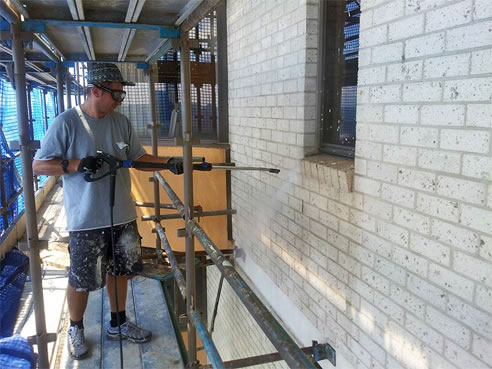 preparing brick wall for waterproofing