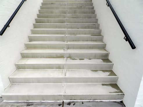 cleaning concrete stairs